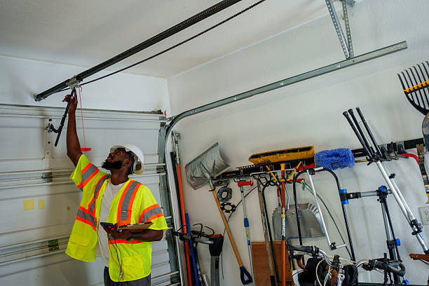 Professional Garage Door Panel Replacement technician working in St. Francis, MN